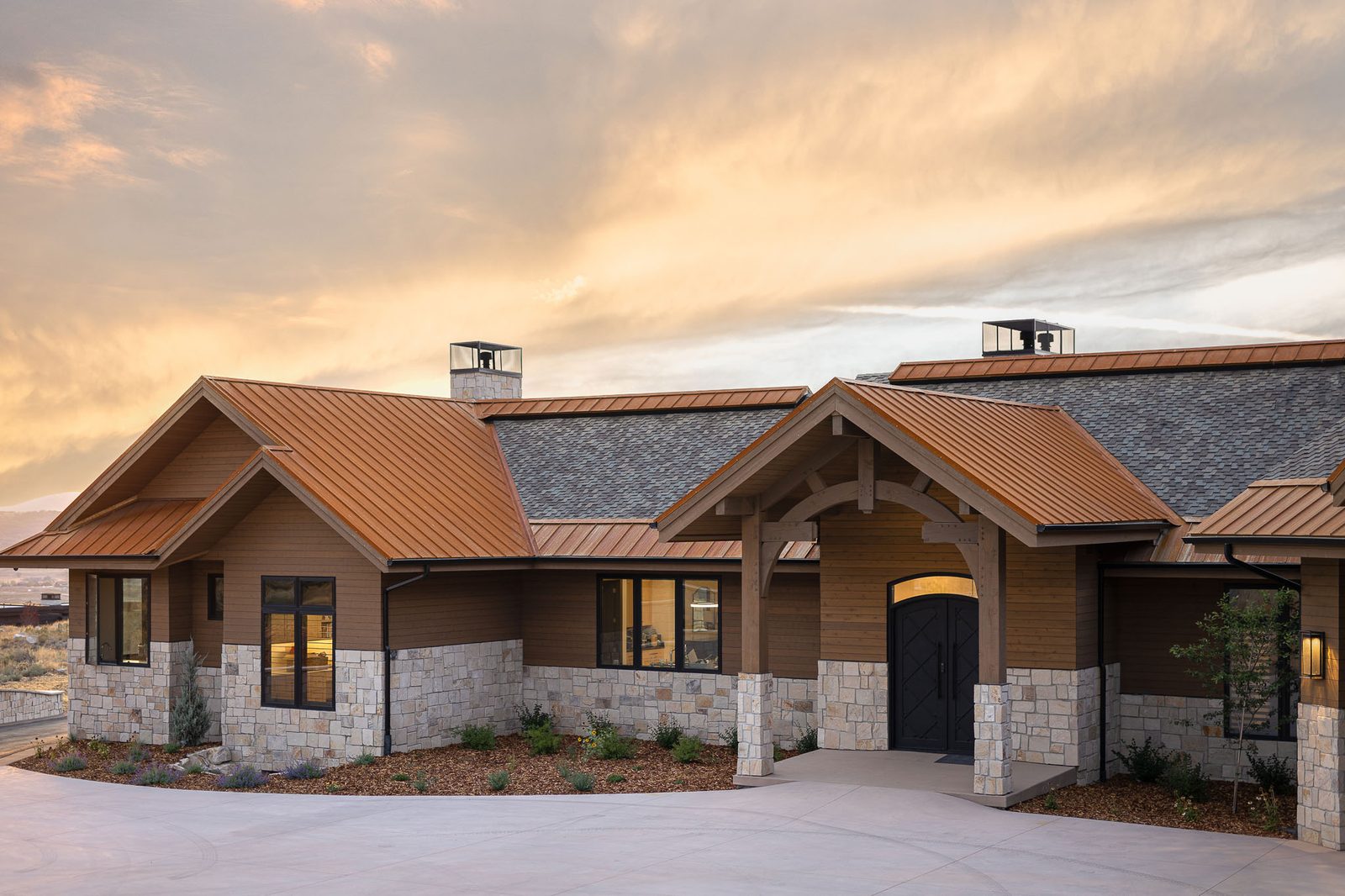 Mountain modern custom home entrance — Ensign Custom Homes Utah